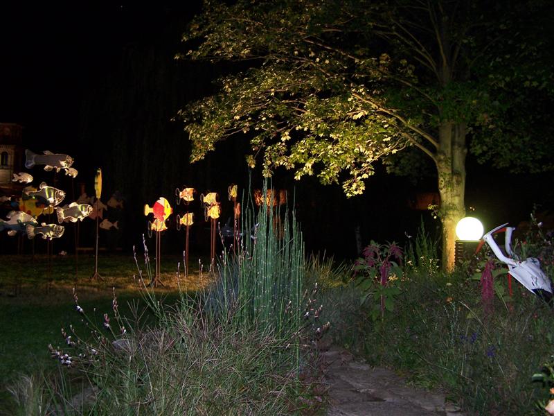 Bubbles Hotel garden at night.